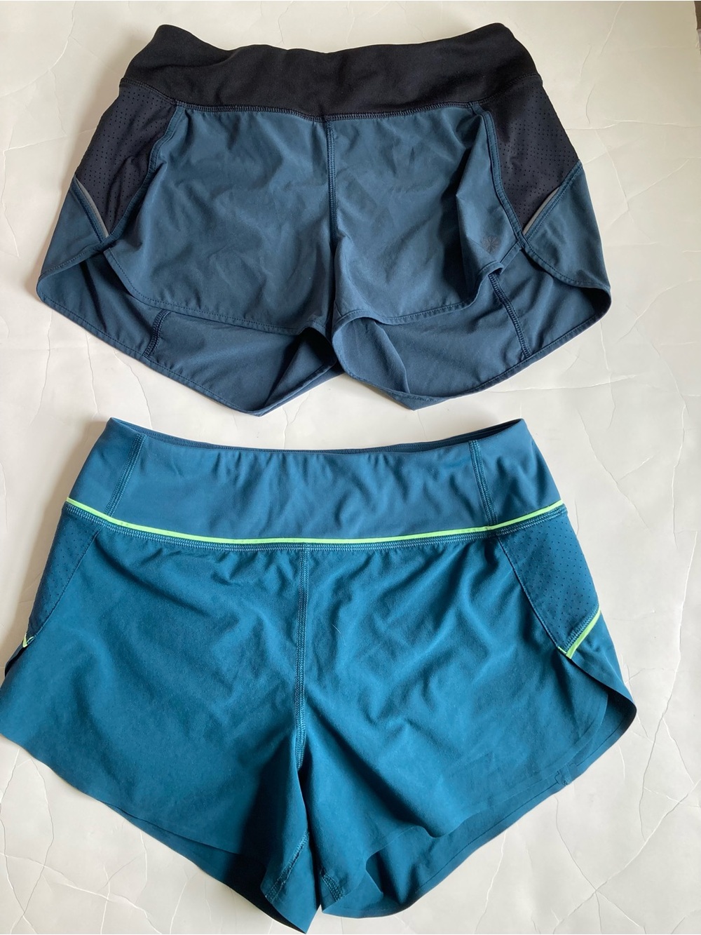Two pairs bundle athleta run with it shorts XS EUC
